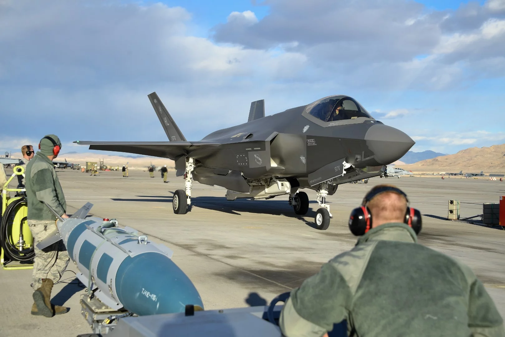 Airmen prepare to load an F-35A prior to a sortie