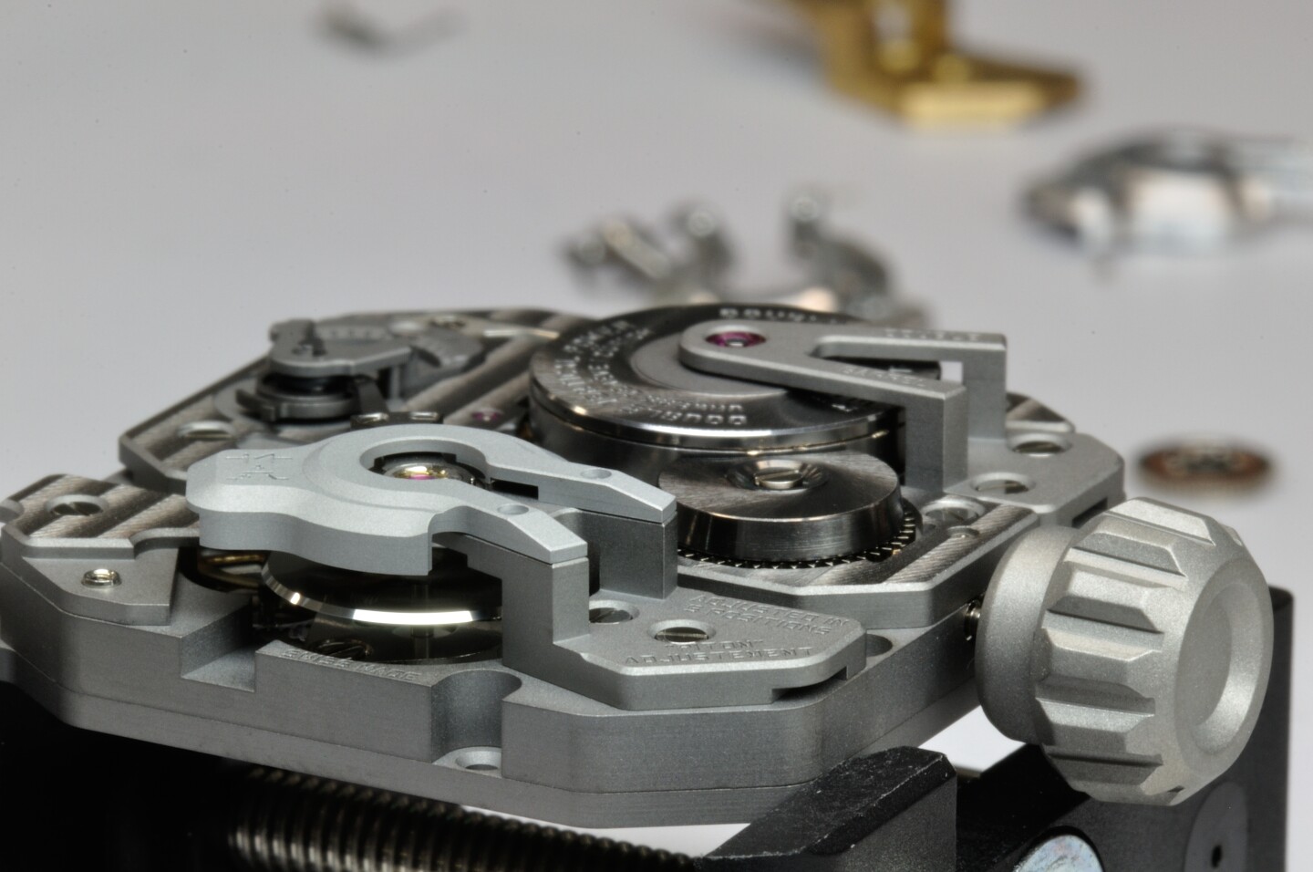 Pressing a button on the watch will trigger an optical sensor on the balance wheel to time its oscillations for about three seconds