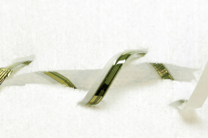 Smart sutures that contain ultrathin sensors to detect when a wound is infected.(Image: John Rogers)