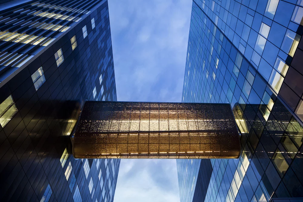 The Centre hospitalier de l’Université de Montréal, by CannonDesign + NEUF architect. A winner under the "Hospitals/Medical Centers" category of the 2018 International Architecture Awards, this structure features a skybridge that connects the hospital to its nearby logistics tower