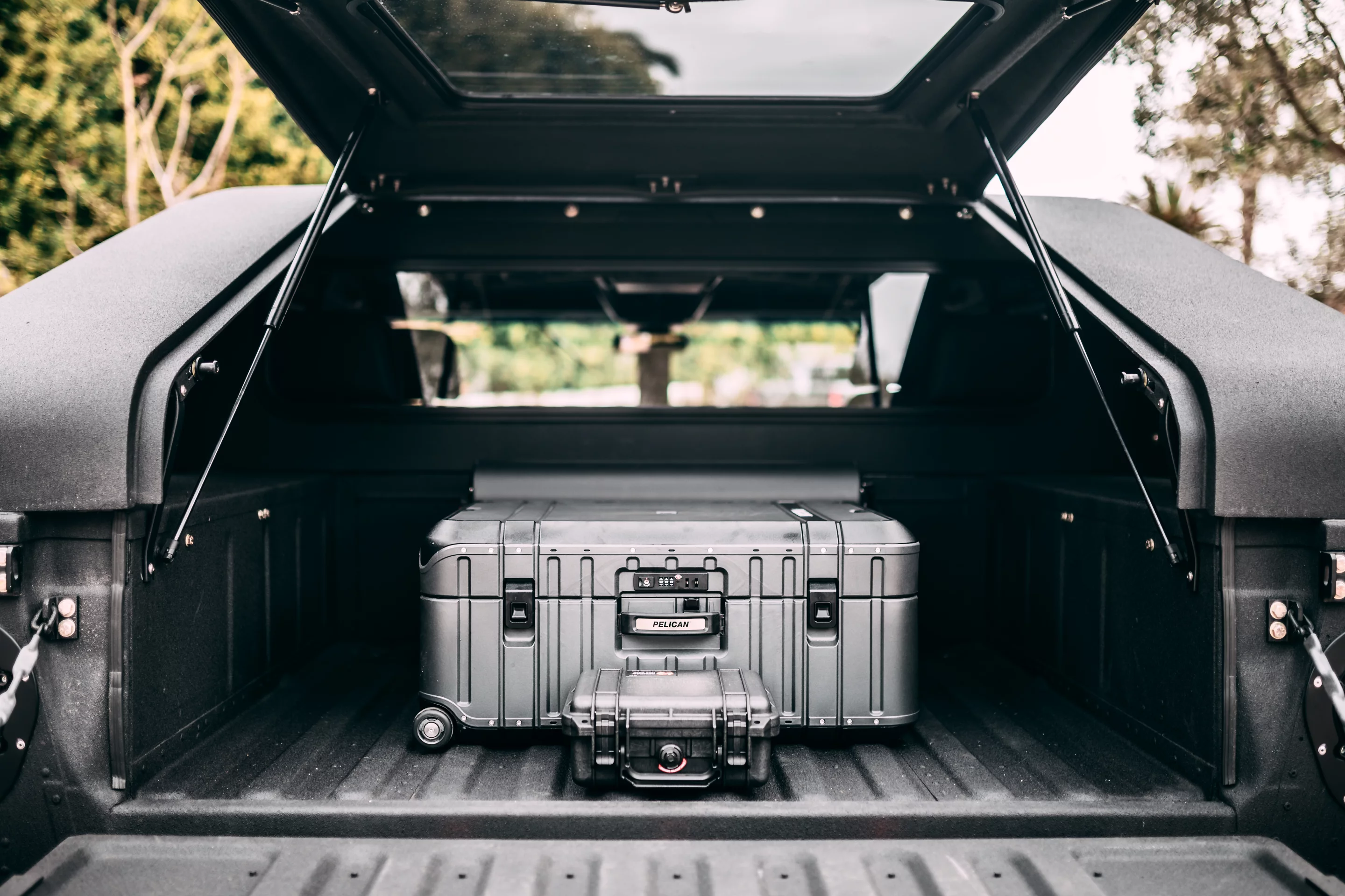 Mil-Spec Auto's custom H1 build includes matching luggage from Pelican