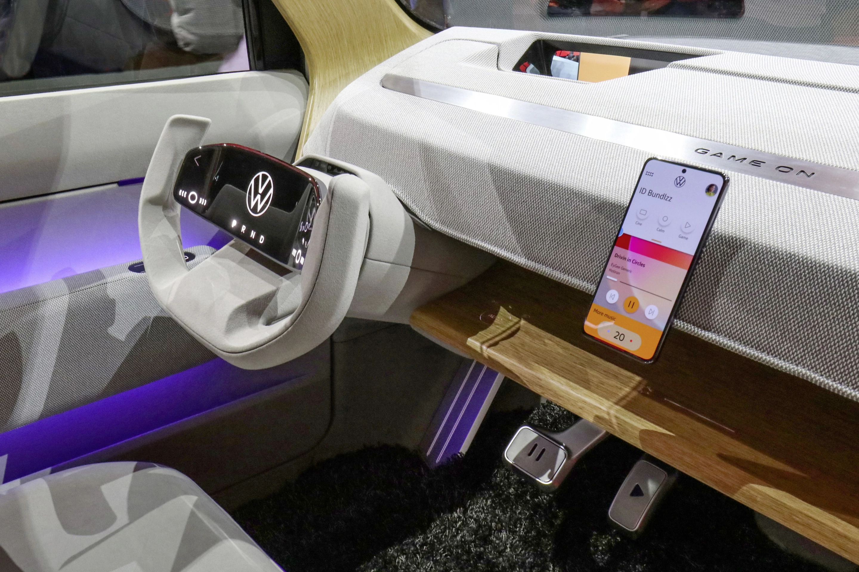 Volkswagen clears out the dashboard area but adds in a retractable projection screen
