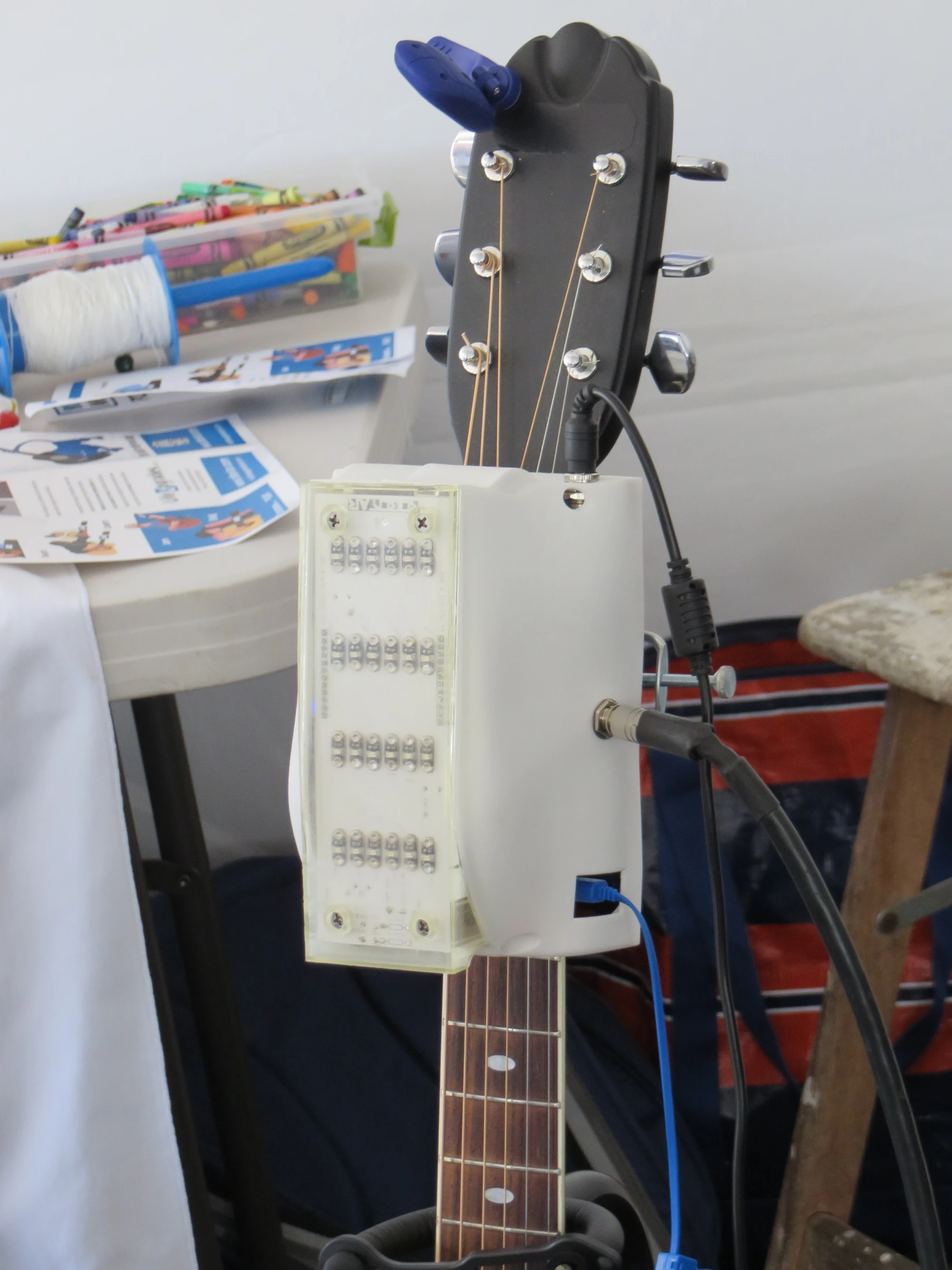 Robotar covers the first four frets of a standard guitar