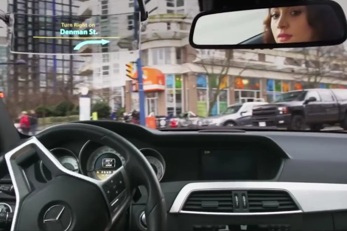 Iris replaces the car's existing driver's-side windshield visor