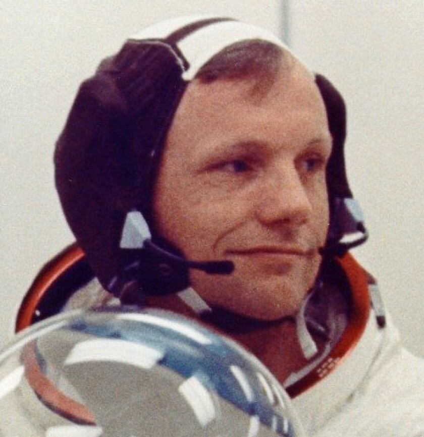 Neil Armstrong wearing "Snoopy cap"
