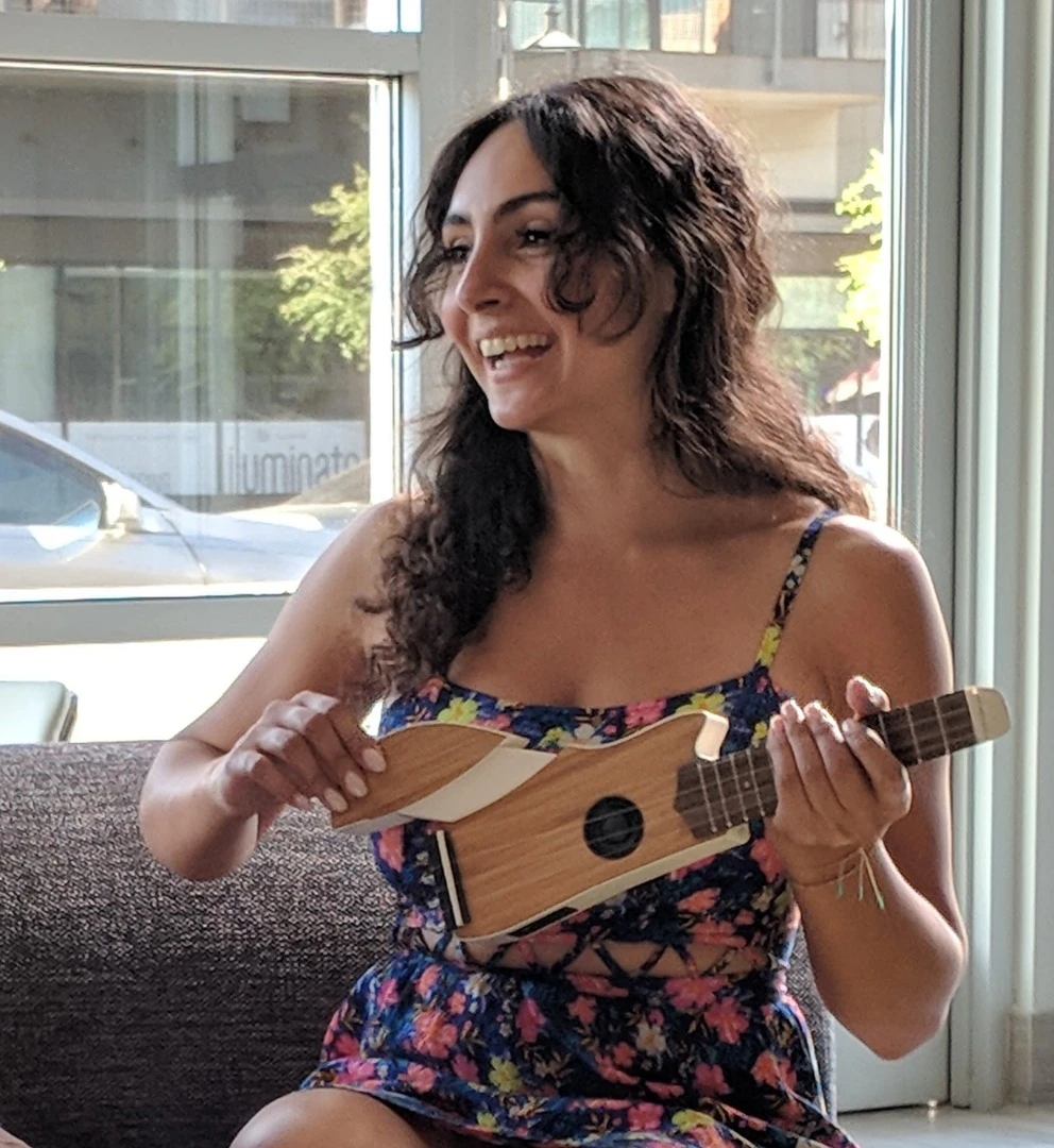 The Ava ukulele has a fold-out wing to help with forearm playing comfort