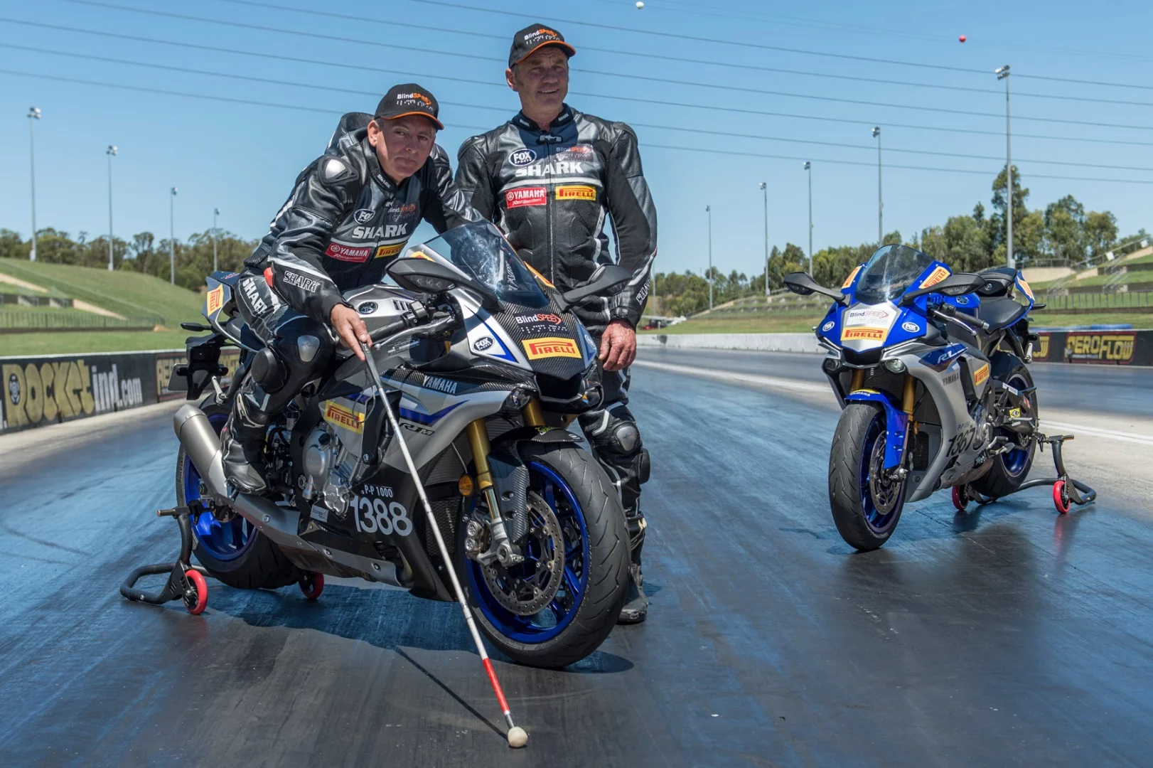 Blind Australian Ben Felten with ex-MotoGP racer Kevin Magee in the lead-up to last year's record attempt, on a pair of Yamaha R1 superbikes