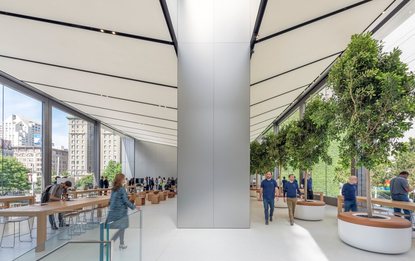 The building has a tapered, opaque-looking ceiling that is covered by custom-made lighting panels used to illuminate the store at night