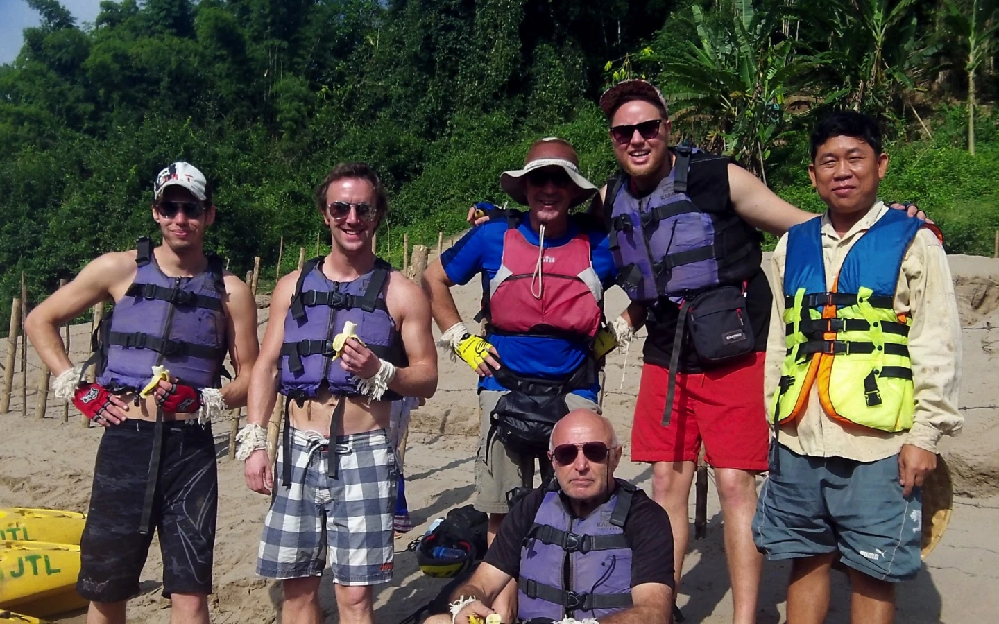 Our intrepid crew on initial kayak trip take on board some sustenance in the form of local bananas before setting out on another leg of the journey