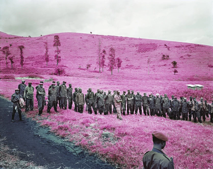 Richard Mosse's amazing series "Infra" depicts rebels in an African civil war using a discontinued military grade infrared film stock that adds surreal pink hues to a landscape devastated by violent conflict