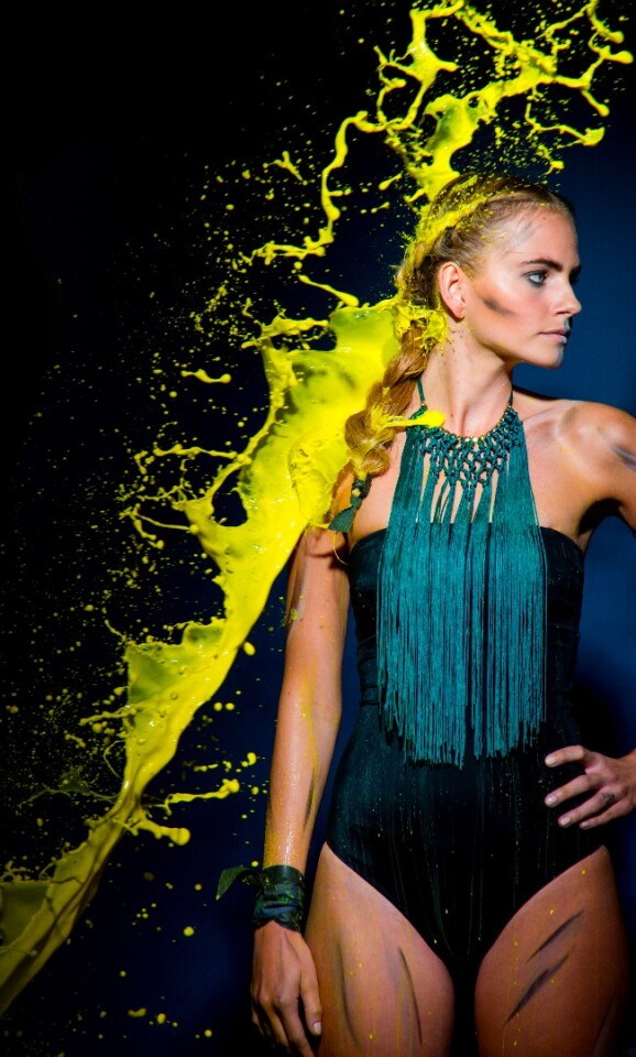 Olympus had a number of demos to show off the speed of their new cameras including models getting paint hurled at them