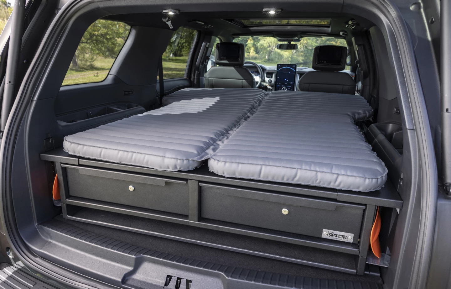 The folded seats, custom-fit bed extender and Luno inflatable double mattress make the Expedition Timberline Off-Grid a sleeper SUV