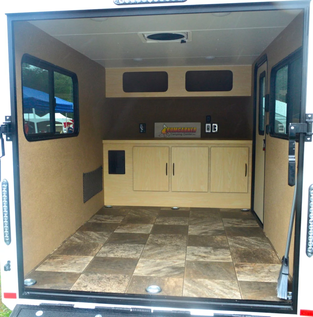 The InTech RV XLT Flyer Mini Camper is a very simple trailer weighing in around 900 lb (408 kg)