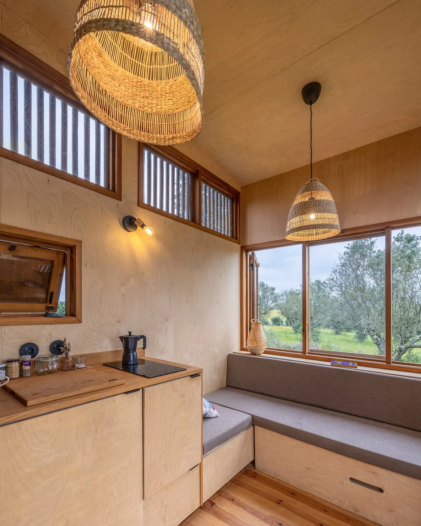 The Pego's living area includes a large L-shaped sofa with integrated storage space