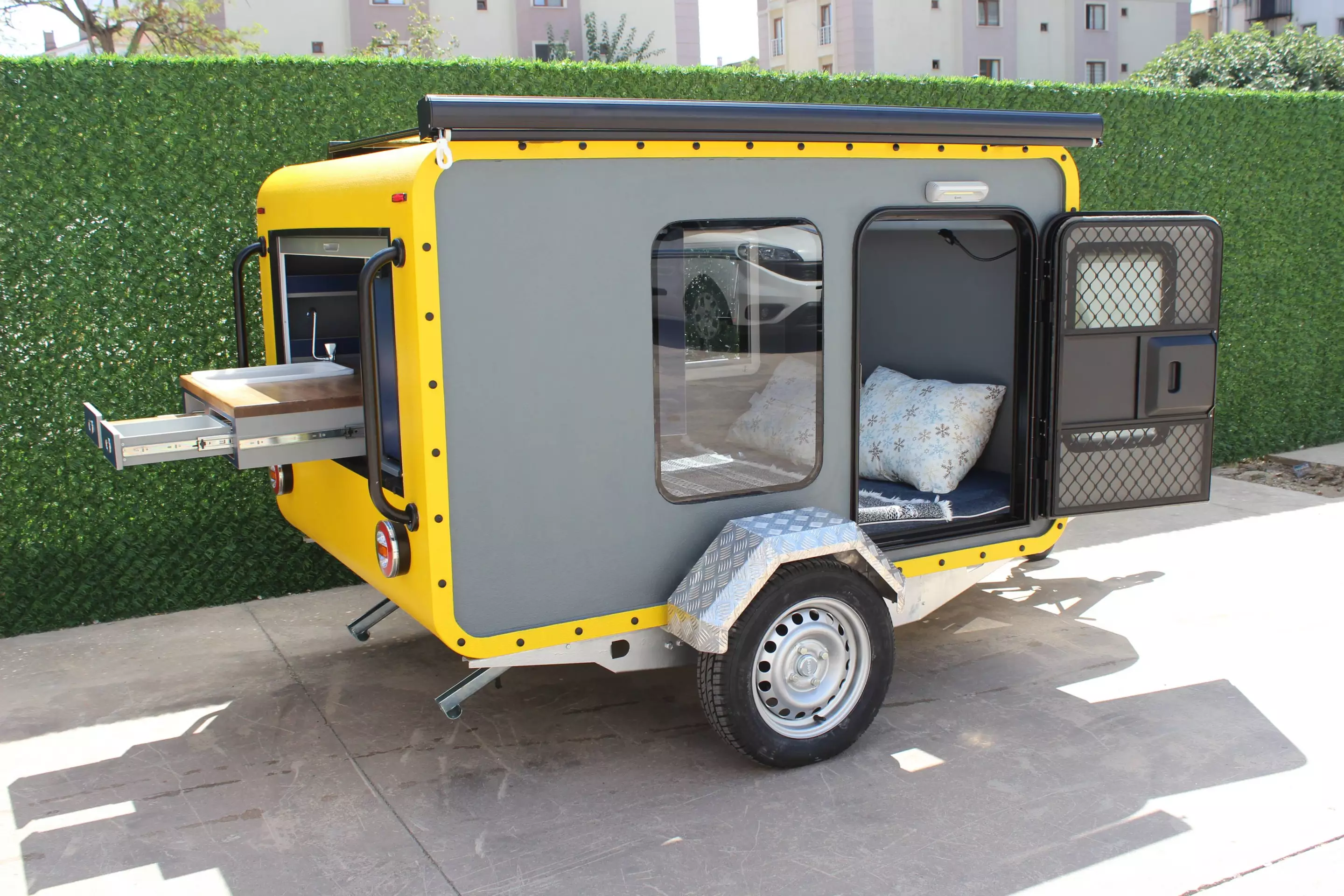 The Mohican sleeps two as standard, but Hotomobil offers an optional rooftop tent for added space