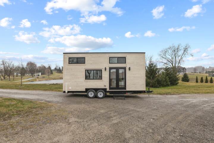 The Coastal Modern has length of 24 ft (7.3 m) and sleeps up to four people