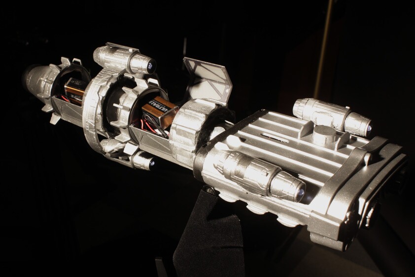 The model spaceship, with internal LED wiring and batteries visible