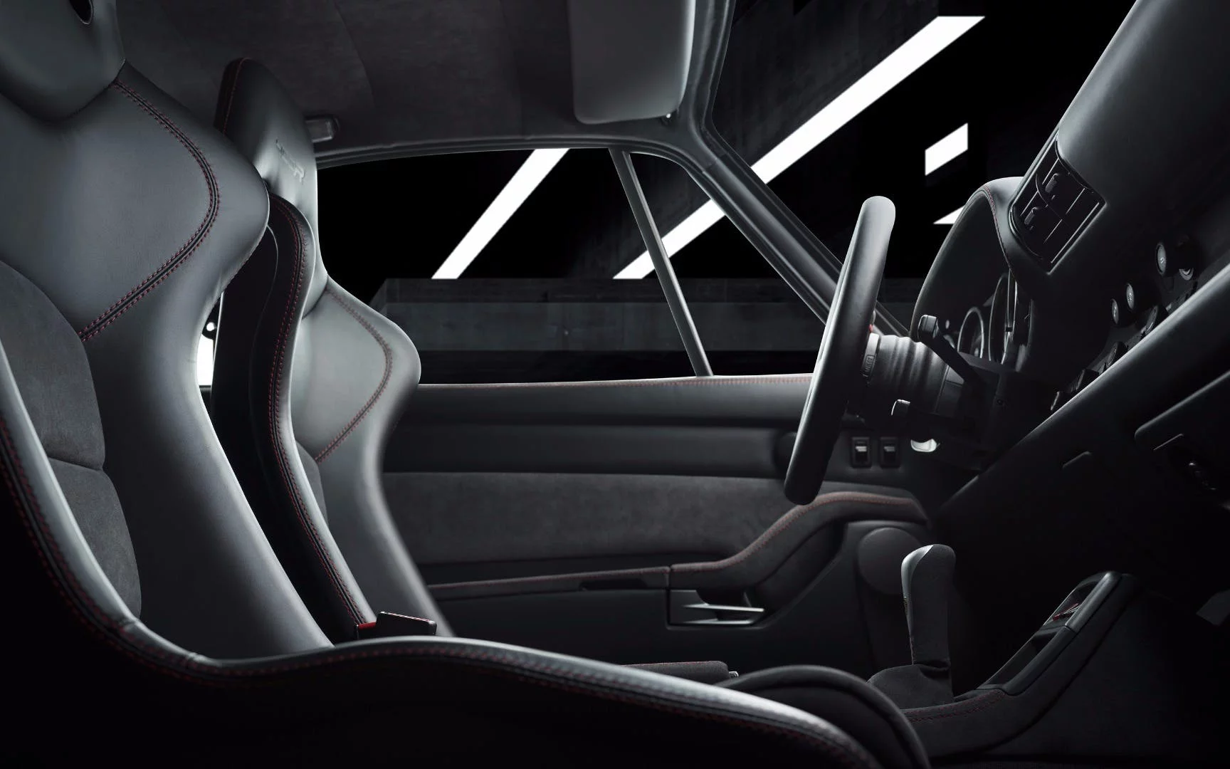 The driver and passenger sit in carbon buckets in the 400R