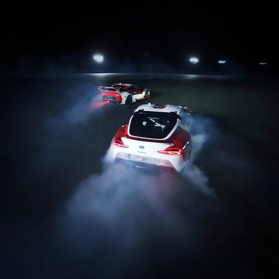 Stanford University's GR Supra pours a tire smoke trail while in chase