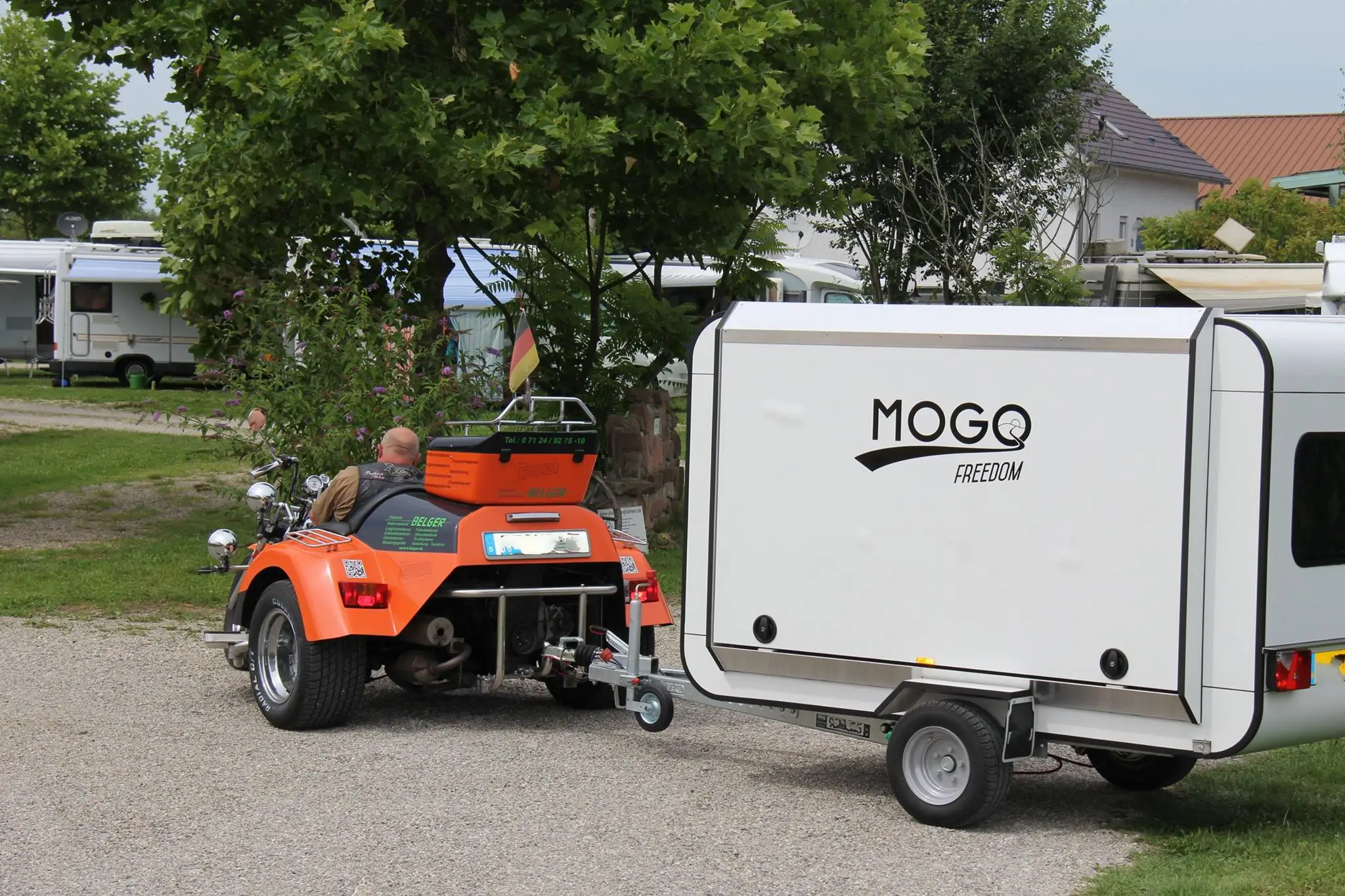 Mogo Freedom doesn't mention two-wheel motorcycles, but it has hauled the trailer with three-wheelers and ATVs