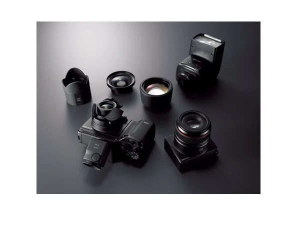 Ricoh's new GXR digital camera system, where the lens and sensor are made into an interchangeable unit that slides into the camera body