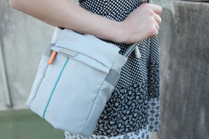 The Cloak Bag is a clever camera carrier that allows you to discreetly take photos without ever having to remove your camera from the bag