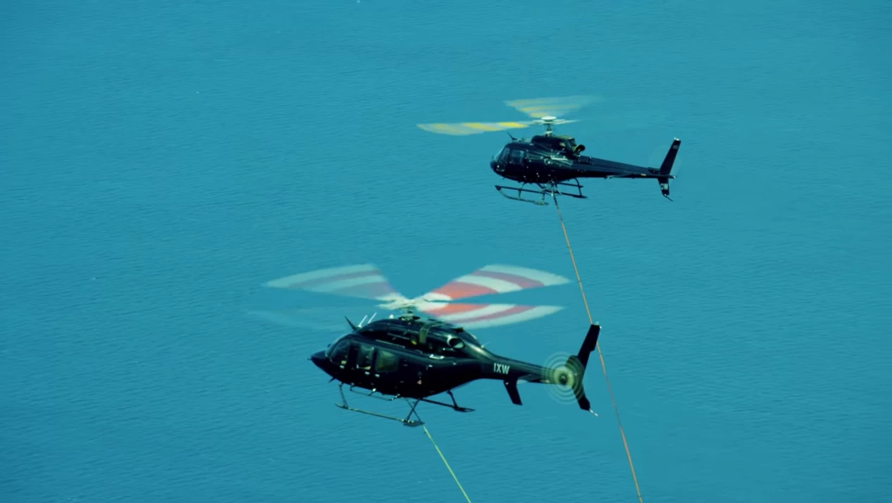 One helicopter was responsible for releasing the rocket and the second did the catching