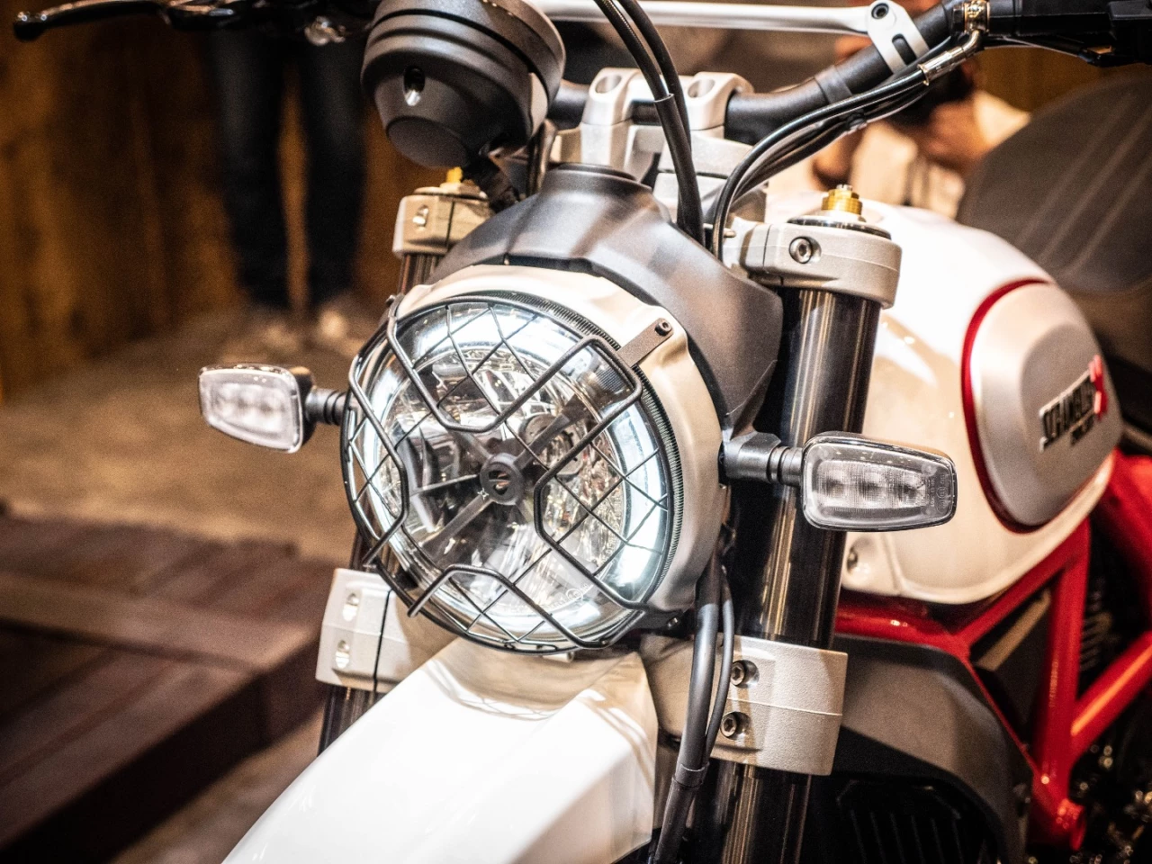 The Scrambler Desert Sled sports a type-approved headlight mesh guard that lends an off-road feel