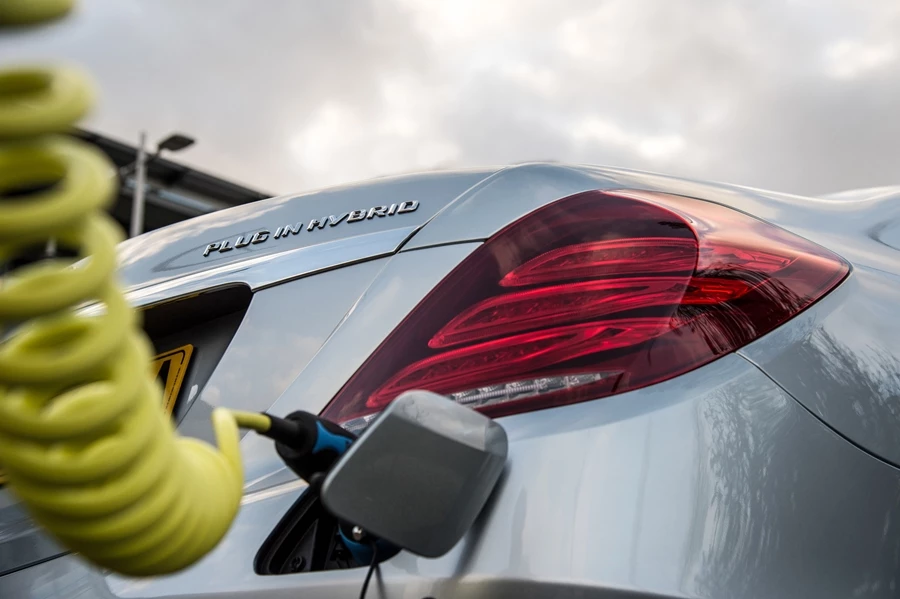 The S500 Plug-in Hybrid AMG Line L plugged-in to charge