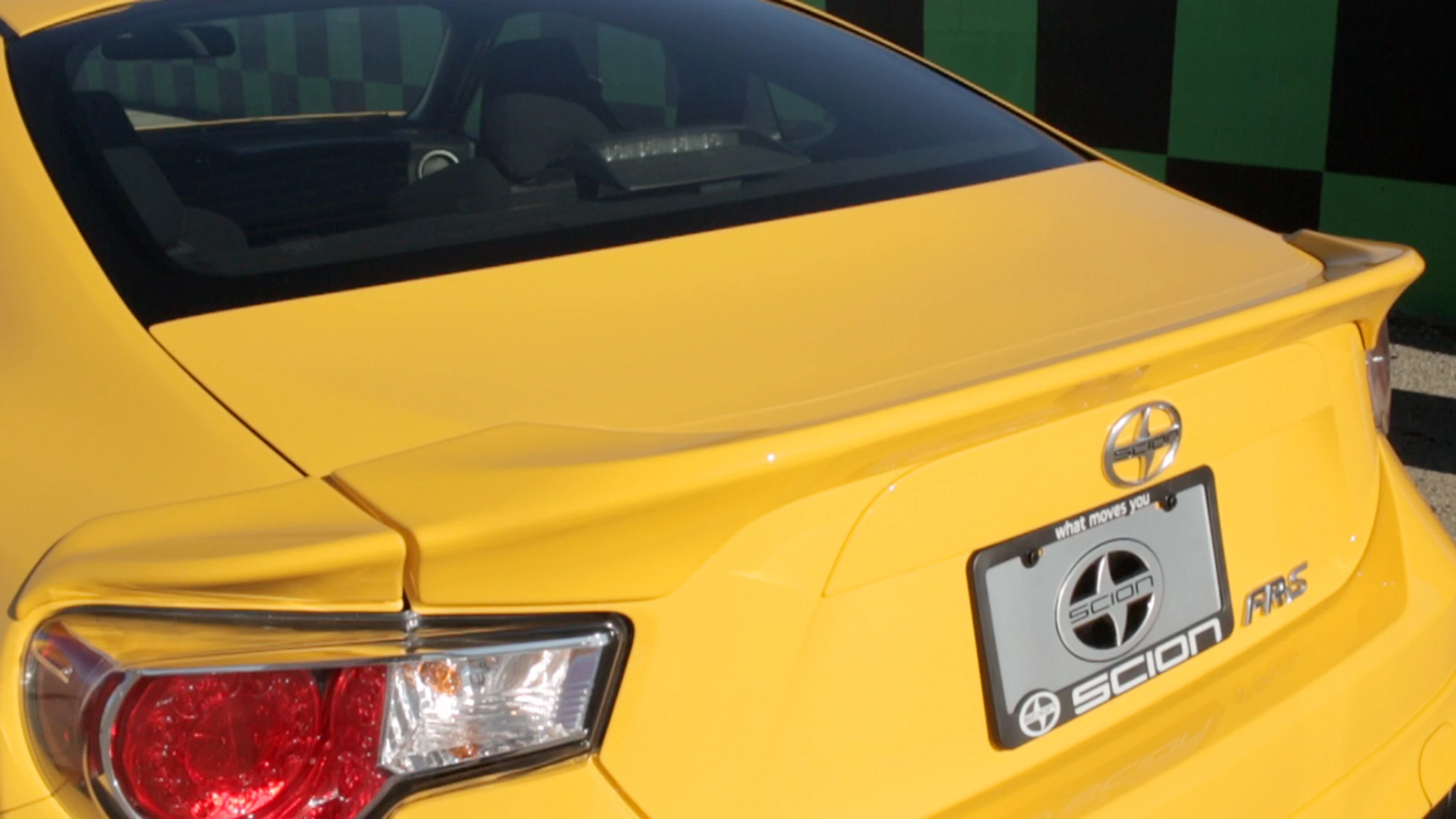 The aerodynamic kit includes a rear spoiler