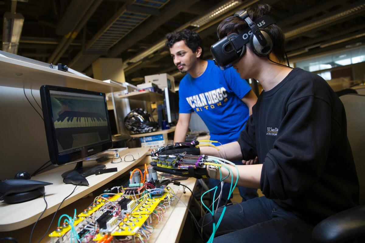 A computer determines how the user's hand movements would correspond to objects in the virtual world, and activates the gloves accordingly
