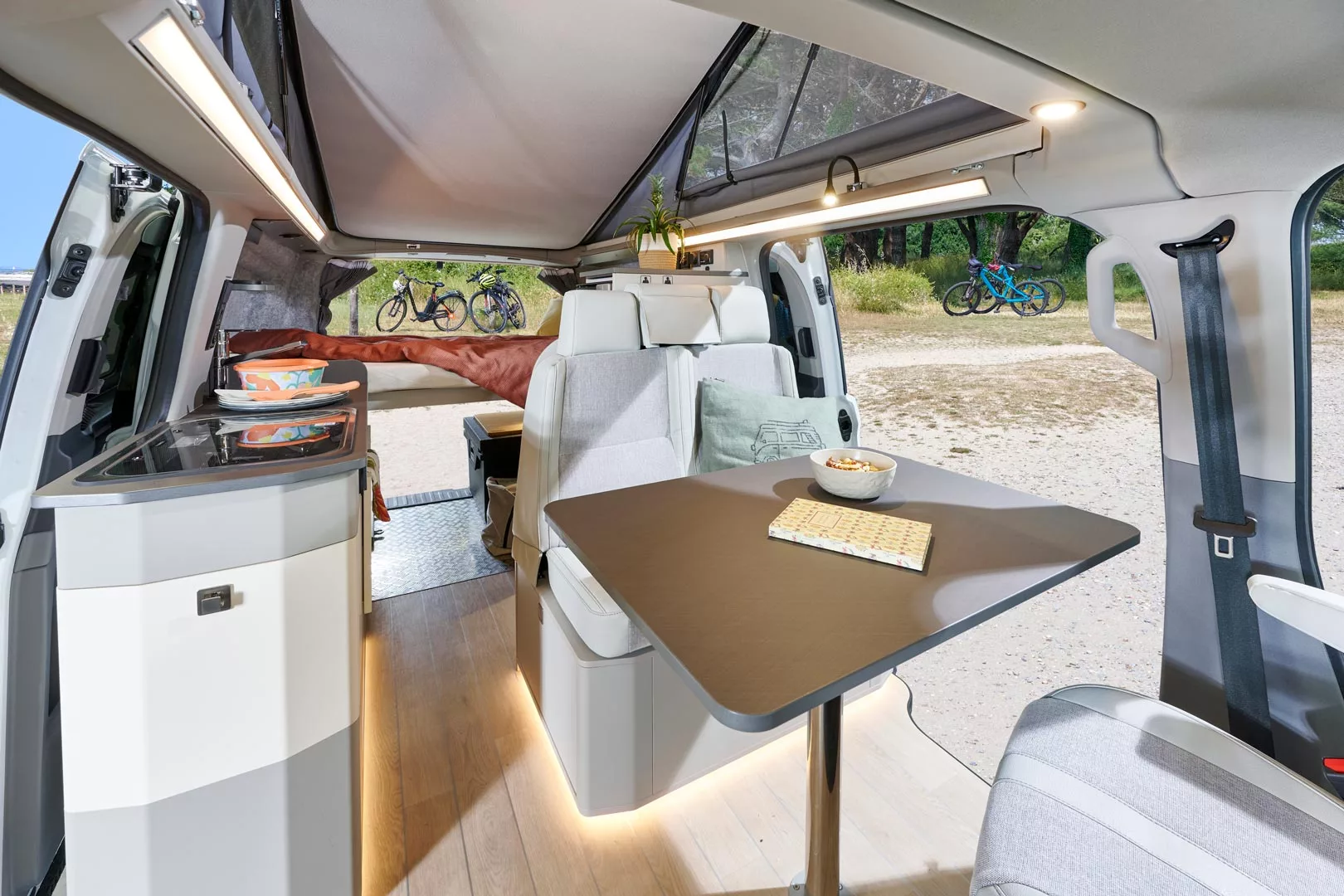 The entire lounge remains intact and the kitchen accessible when the rear transverse bed is installed