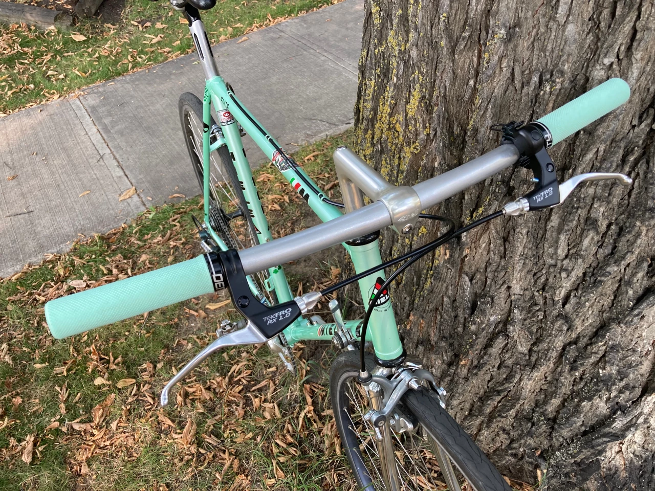 If you find that your bike's original quill stem (pictured) is at too low of an angle, you can buy an adapter that lets you use a raised-angle modern threadless stem with the bike's existing steerer tube