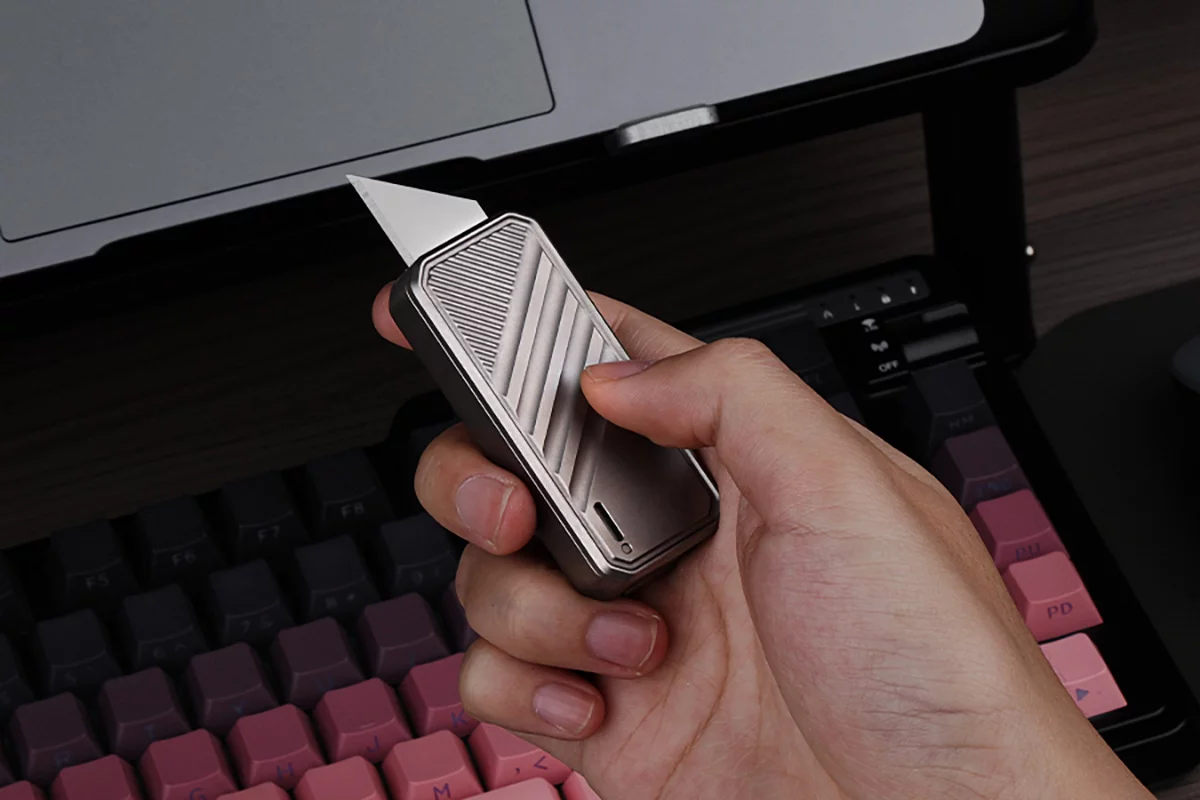 DeckShiv: fidget slider and knife combo for focus