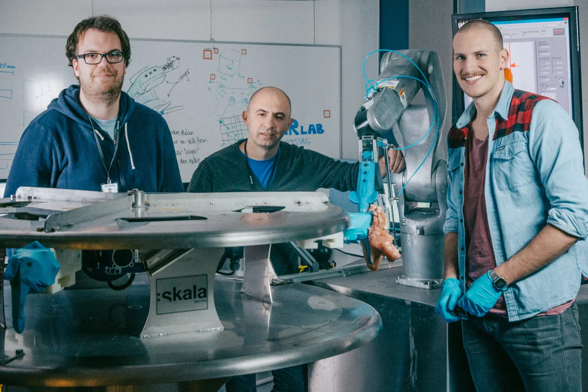 SINTEF researchers Elling Ruud Øye, Ekrem Misimi and Aleksander Eilertsen (left to right) with Gribbot