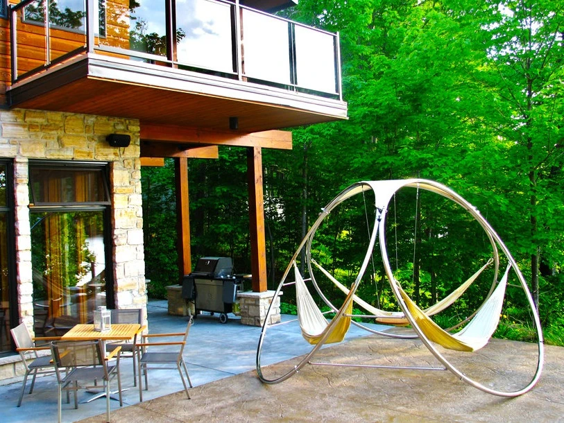 The modern-looking Infinity looks right at home in a garden surrounded by woodland