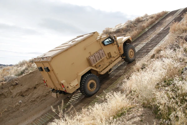 A military-spec MXT APC demonstrates its climbing abilities