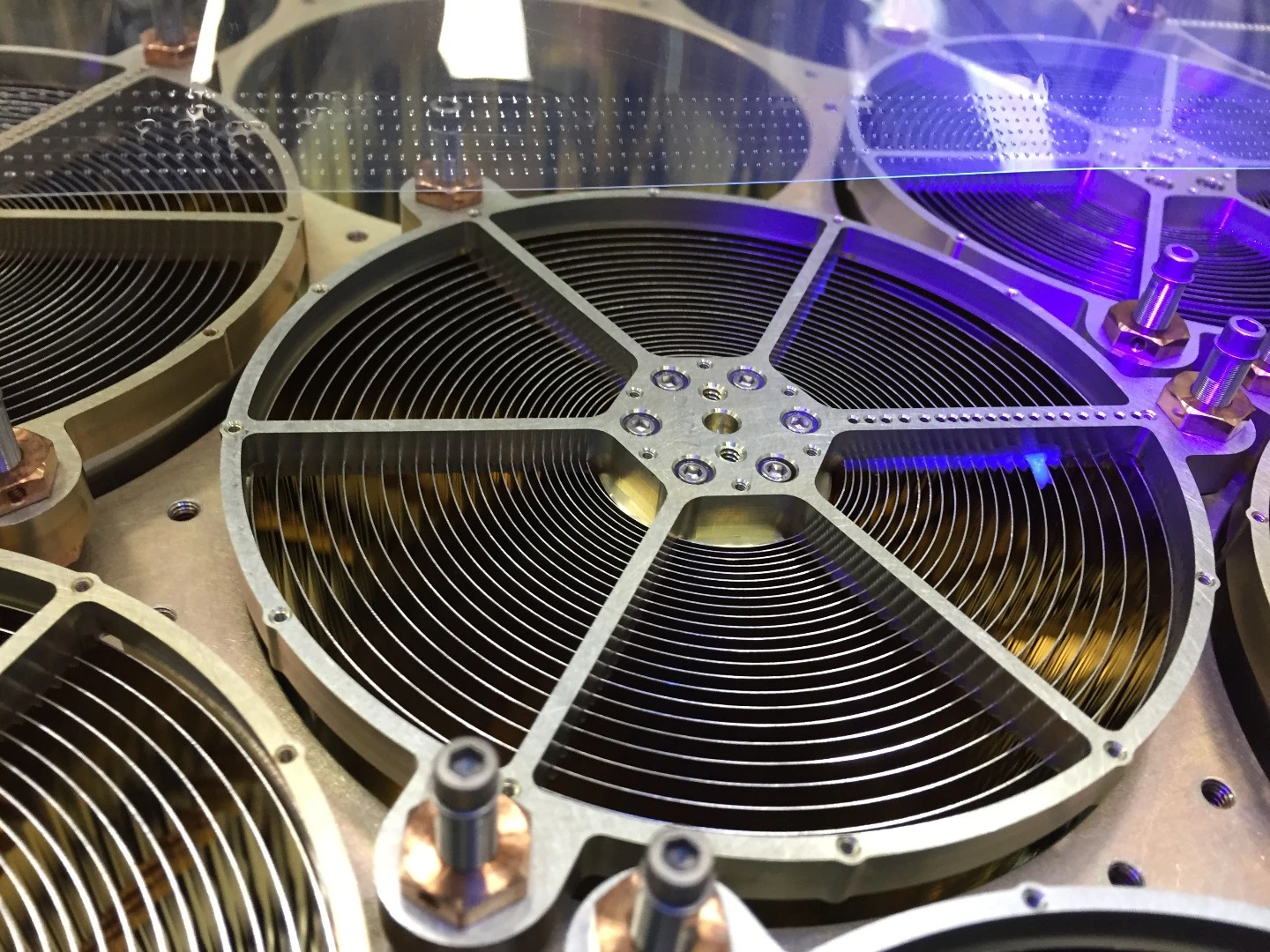 The mirror assemblies onboard NICER help funnel x-ray signals onto silicon detectors, helping the instrument spot and track pulsars from across the universe
