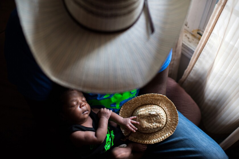 The grand prize winner comes from the same photographer as the previous photo. Newest Cowboy in Town sees baby Jestin welcomed home by his father Jessie in Cleveland, Minnesota