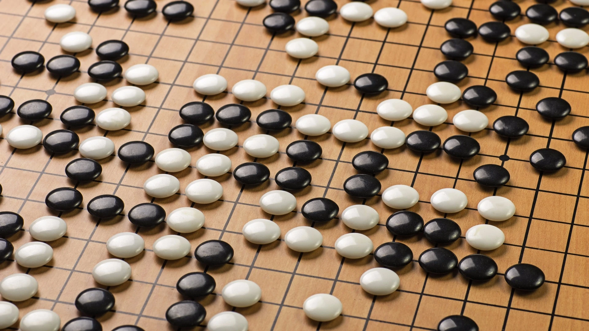 Google's AlphaGo AI system has beaten the world's top-ranking Go player in the first of three games