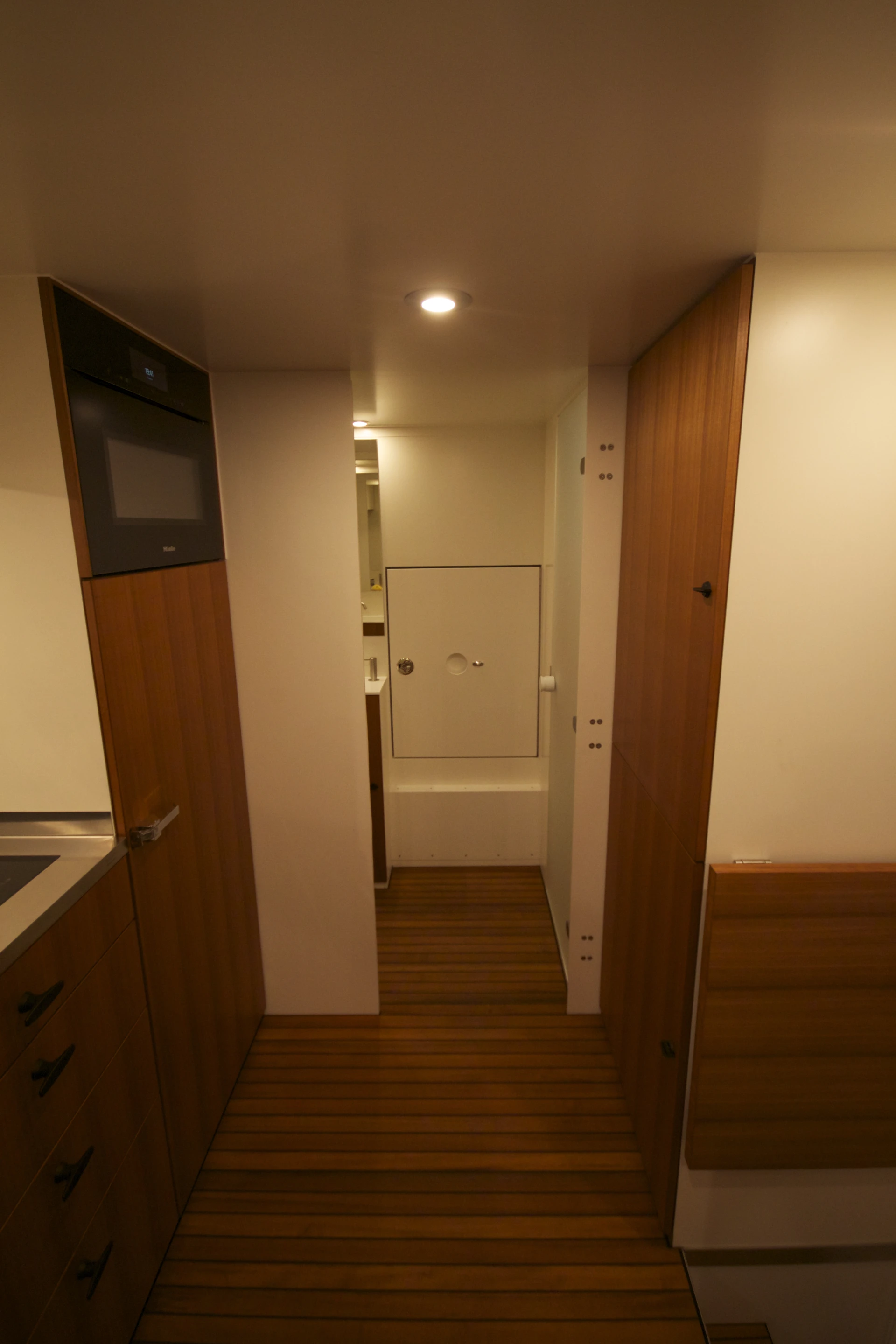 Opening the door for bathroom and pass-through access