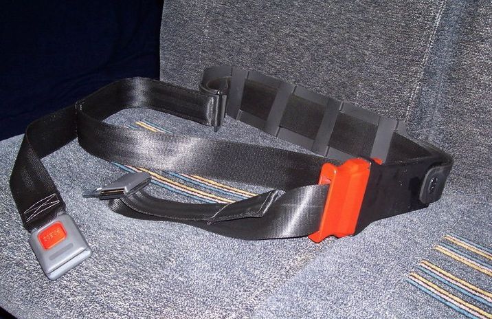 One loop of webbing holds the belt to the seat, while the belt itself goes around the passenger’s waist