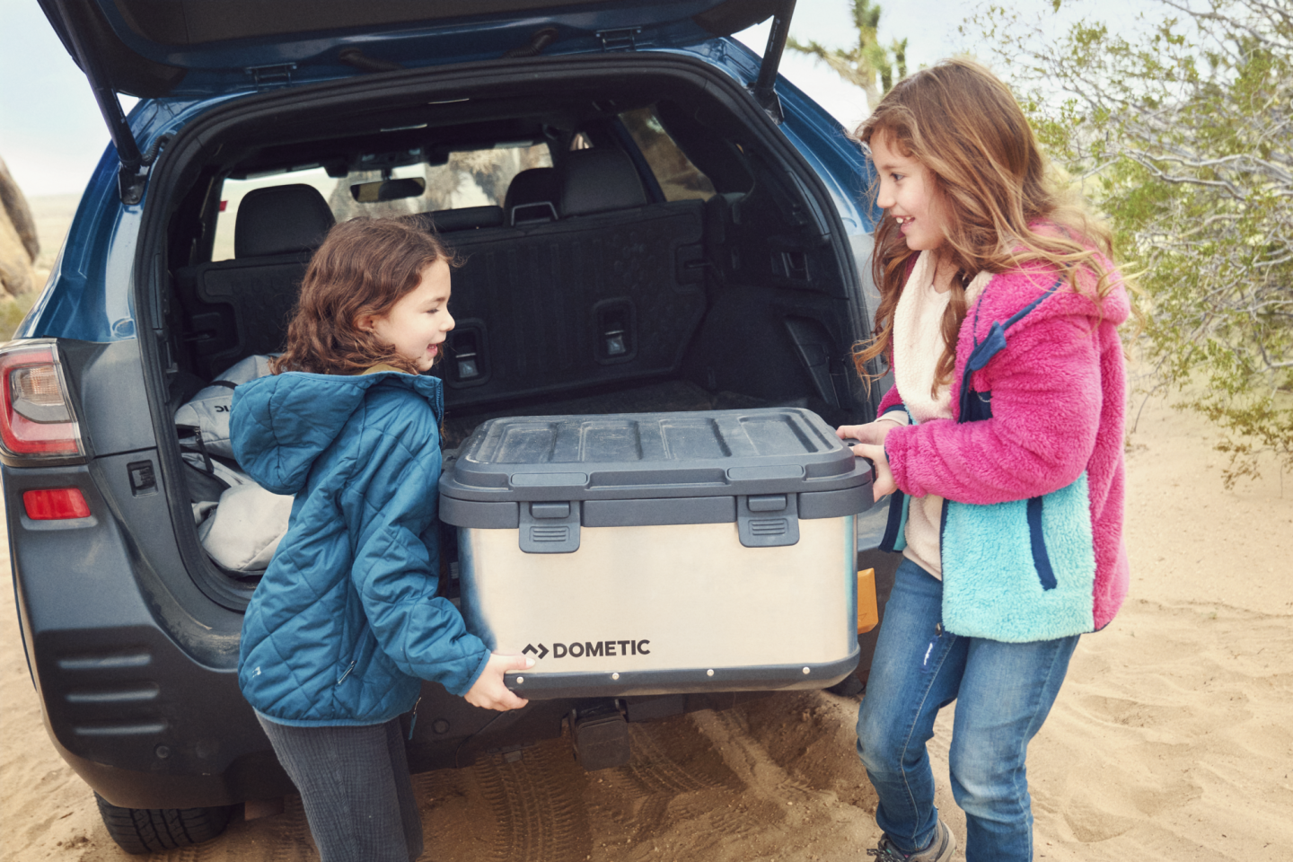 Dometic turns car into camper via stackable, trunk-size base camp kit The PAC H50 is a stackable hard storage box with integrated carry handle and tie-down