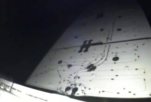 Dragon deploying its solar array