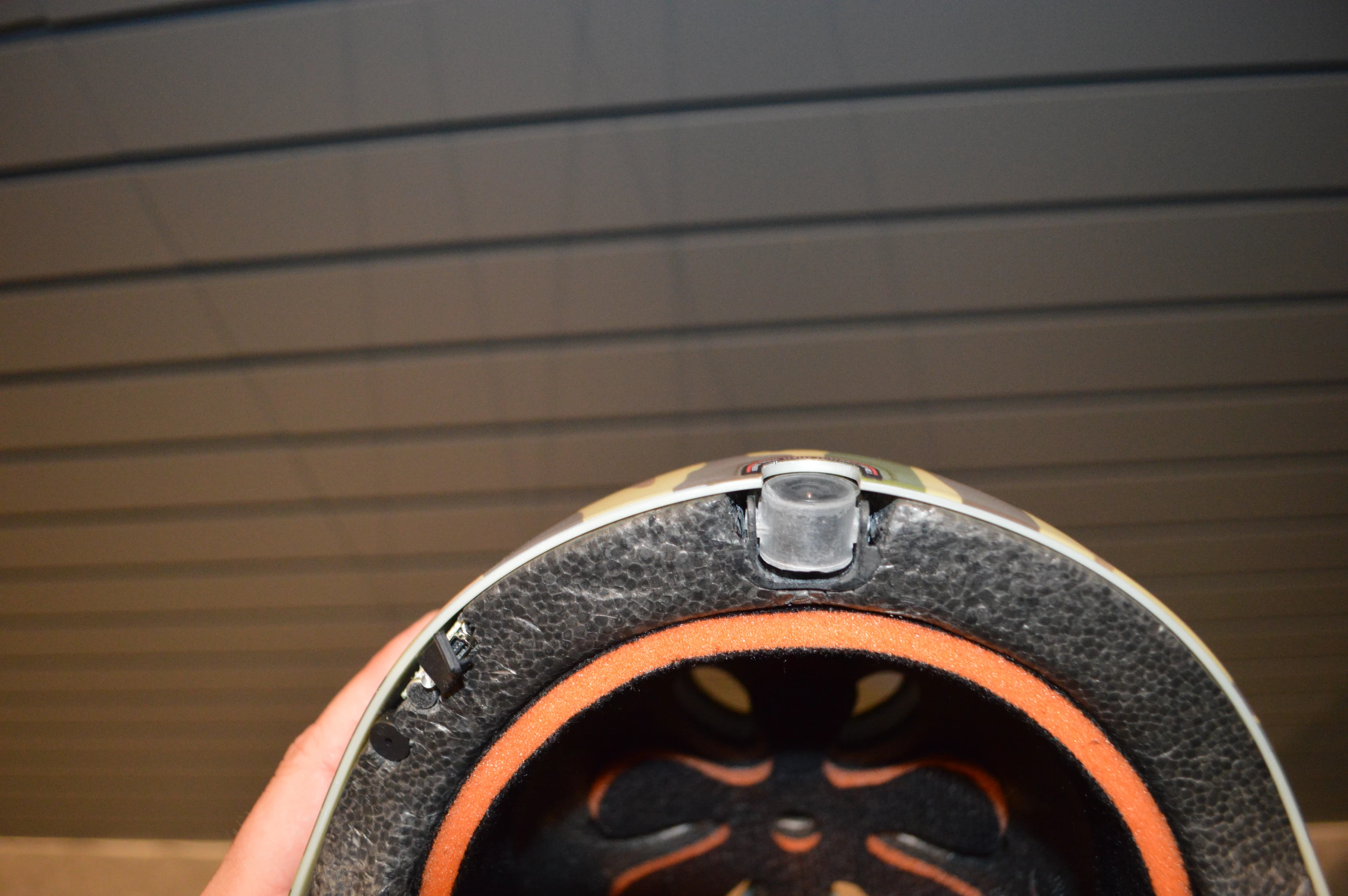 The lens is built into the front of the helmet and offers several positions