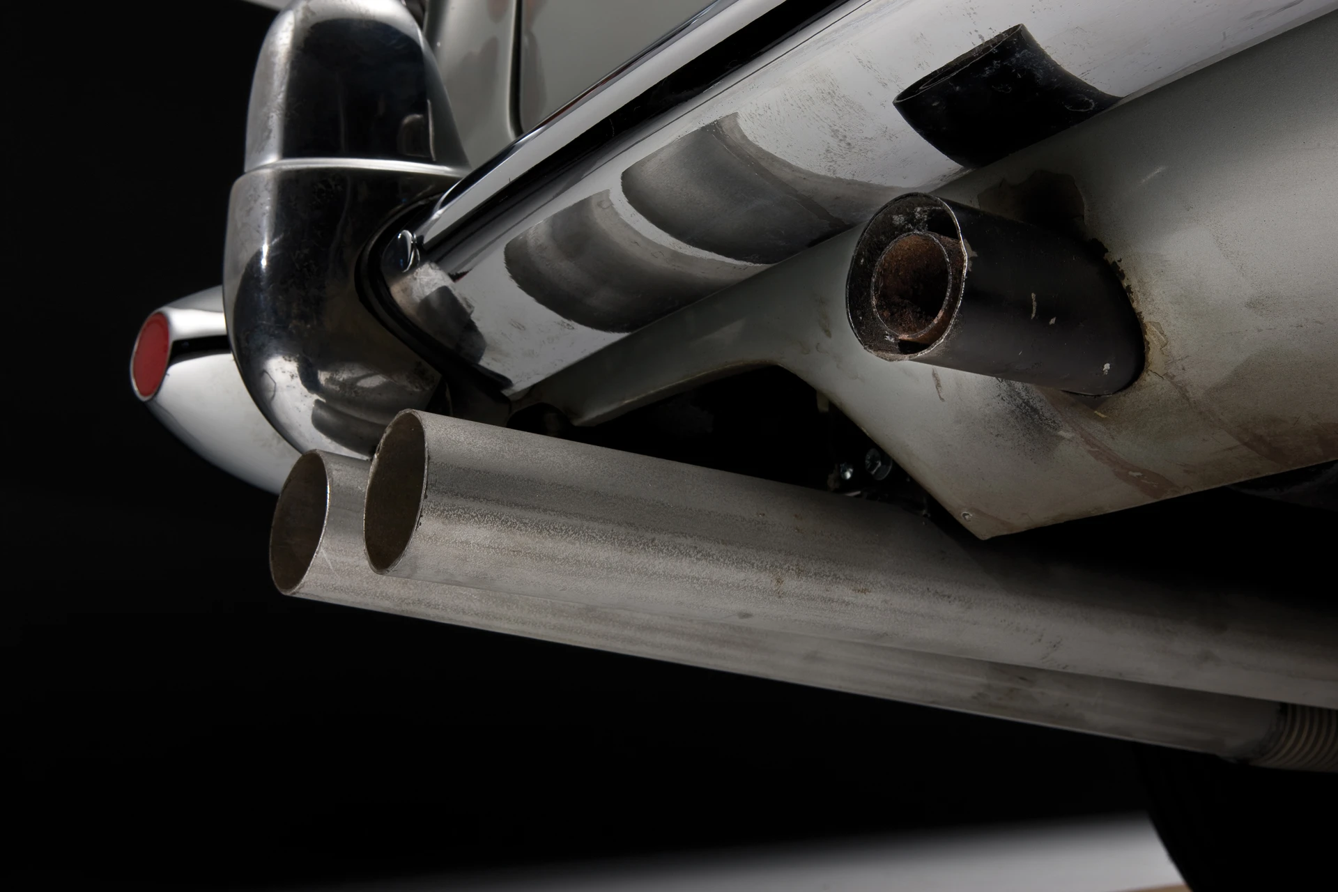 The tailpipes, and smoke screen pipe