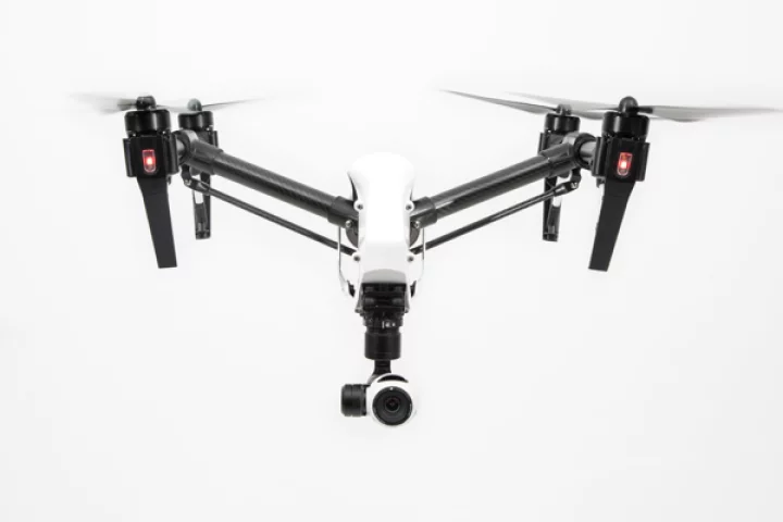 The DJI Inspire 1, with its landing gear and prop arms raised for flight