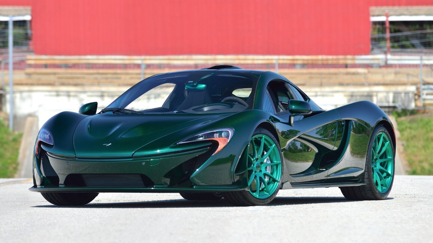 This 2014 McLaren P1 boasts Serial no. #02 (the earliest P1 serial number offered to the public), and was estimated to sell for between $2,500,000 and $3,000,000. The original car was sent back to McLaren to be refitted with an exposed carbon fiber body, and this sale included the original painted body too. The 900 horsepower hybrid had only 576 miles on the clock when it sold for $2,035,000 at Mecum Auctions