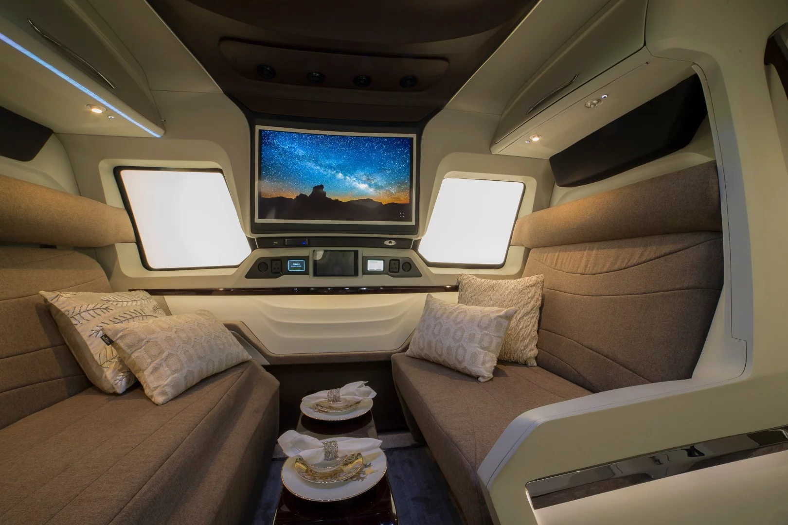 PSV has created a very nice look inside, with lounge seating and set-in TVs