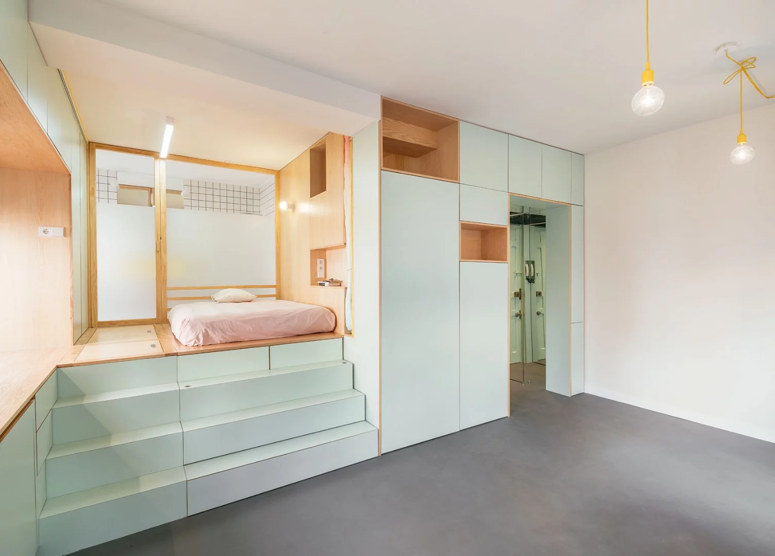 The wet zones, kitchen, laundry, bathroom, cupboards and storage spaces are all built into this single unit